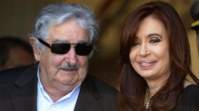 Tell us you really feel, José -   Hot mike catches Uruguayan President taunting Fernandez de Kirchner